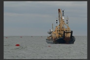 A vessel engaged in underwater operations where an obstruction exists