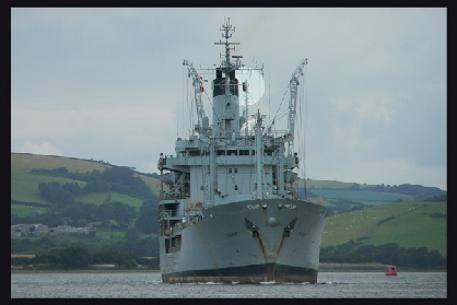 A power-driven vessel underway, showing a cylinder to indicate she is constrained by her draft