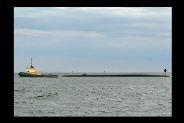 A tug (under 50m) towing an inconspicuous object