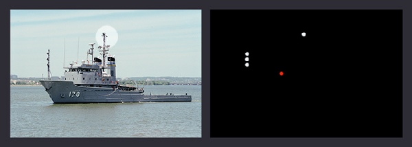 A large towing vessel (USN) from port showing the signal (diamond) and  the 3 masthead lights forward for tow over 200m