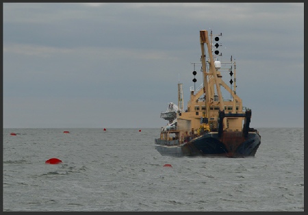 A vessel engaged in underwater operations where an obstruction exists