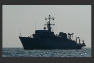 A vessel engaged in mine clearance operations