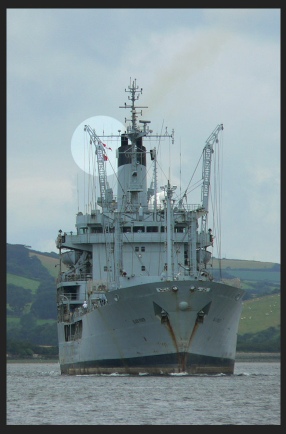 A Royal Fleet Auxiliary displaying International Code flag H and Code Pennant