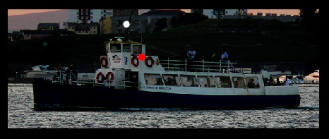 Passenger vessel less than 50m showing sidelight and masthead light