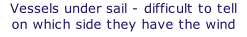 Vessels under sail - difficult to tell on which side they have the wind