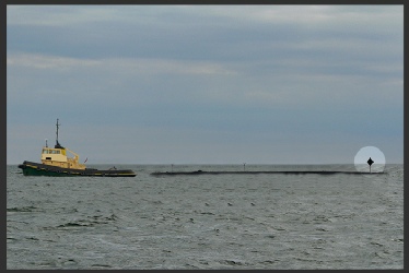 An inconspicuous object being towed - displaying a diamond aft