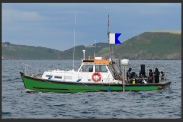 A small vessel engaged in diving operations